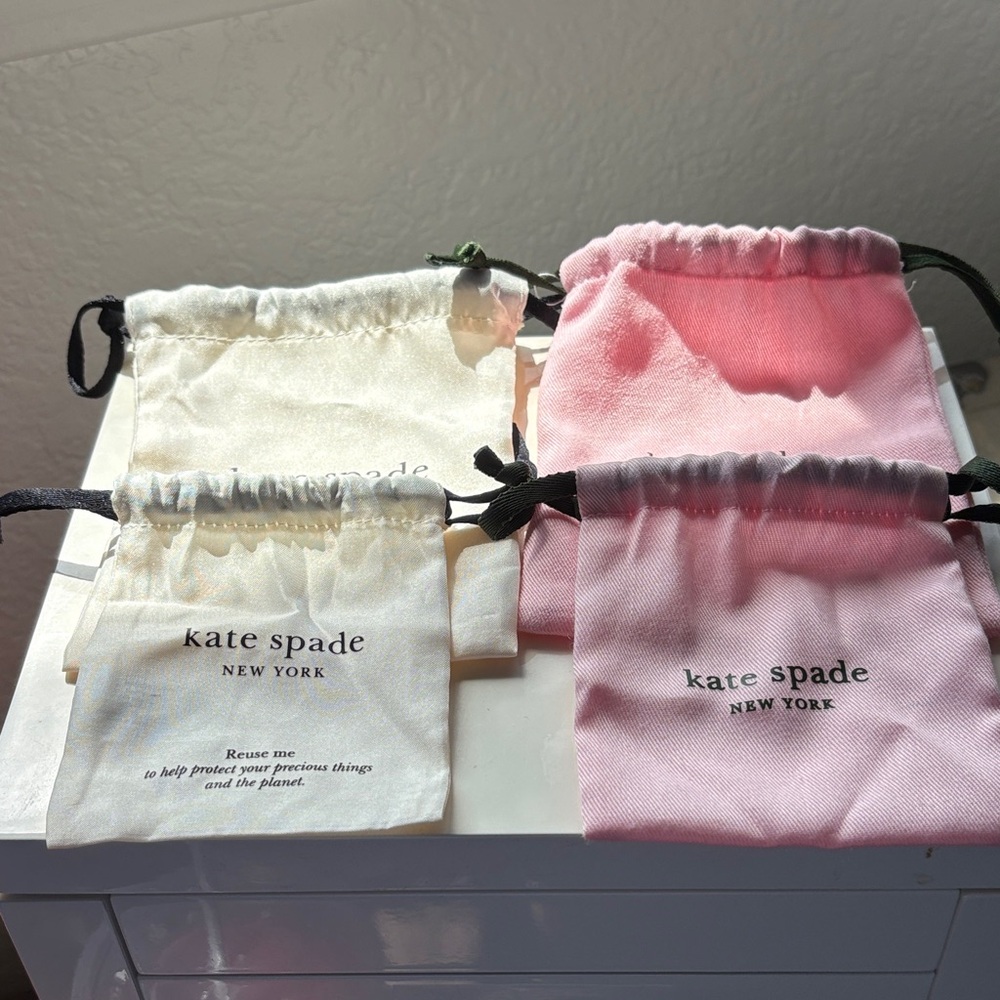 Kate Spade Pink and White Pouch Set